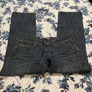 Exocet Stylish Blue Denim Jeans Women’s Size 9 with stylish details on pockets.